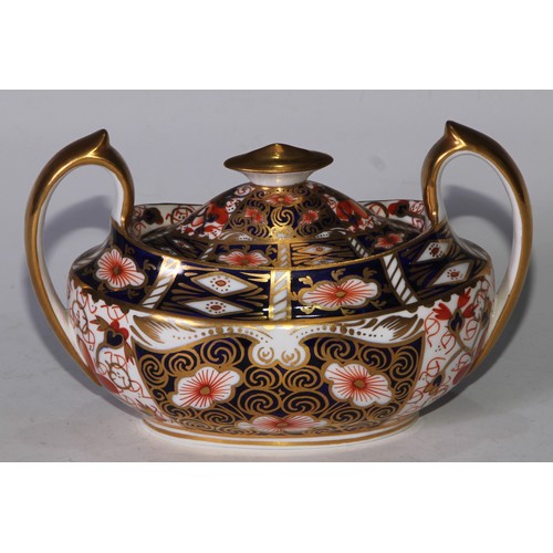 619 - A Royal Crown Derby 2451 pattern three piece tea service, comprising teapot, milk jug and sucrier, t... 