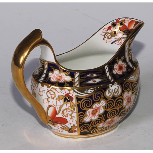 619 - A Royal Crown Derby 2451 pattern three piece tea service, comprising teapot, milk jug and sucrier, t... 