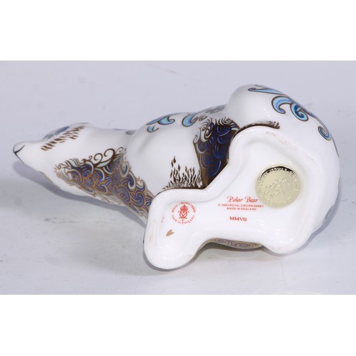 771 - A Royal Crown Derby paperweight, Starlight Hare, printed mark, gold stopper; others, Polar Bear; Bad... 