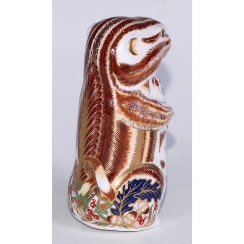 771 - A Royal Crown Derby paperweight, Starlight Hare, printed mark, gold stopper; others, Polar Bear; Bad... 