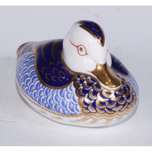 770 - A Royal Crown Derby paperweight, Pheasant, gold stopper; another, similar, no stopper; a Royal Crown... 