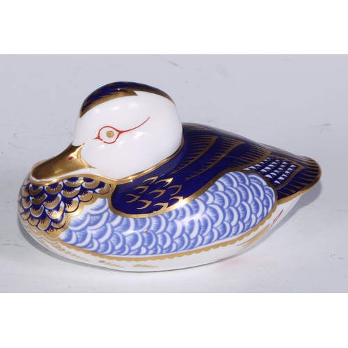 770 - A Royal Crown Derby paperweight, Pheasant, gold stopper; another, similar, no stopper; a Royal Crown... 