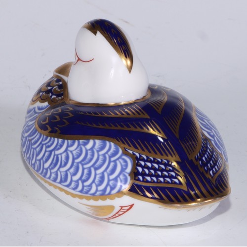 770 - A Royal Crown Derby paperweight, Pheasant, gold stopper; another, similar, no stopper; a Royal Crown... 