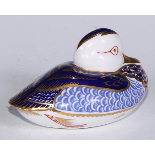 770 - A Royal Crown Derby paperweight, Pheasant, gold stopper; another, similar, no stopper; a Royal Crown... 