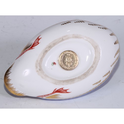 770 - A Royal Crown Derby paperweight, Pheasant, gold stopper; another, similar, no stopper; a Royal Crown... 