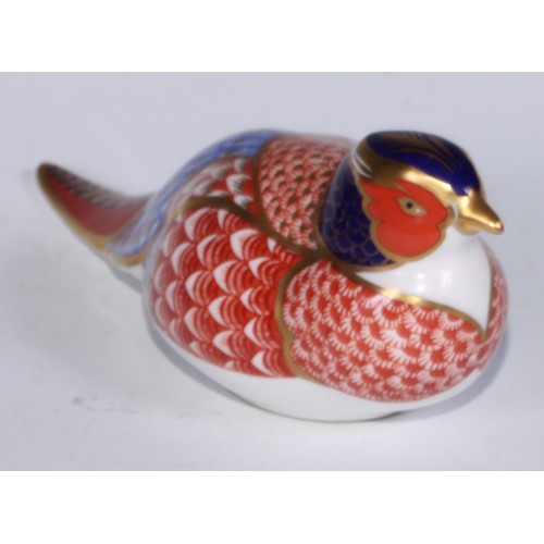 770 - A Royal Crown Derby paperweight, Pheasant, gold stopper; another, similar, no stopper; a Royal Crown... 