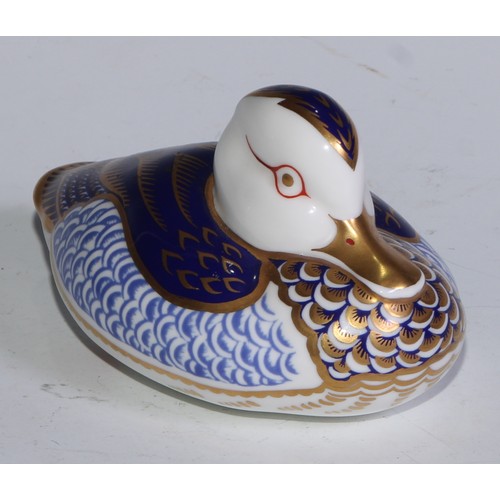 770 - A Royal Crown Derby paperweight, Pheasant, gold stopper; another, similar, no stopper; a Royal Crown... 