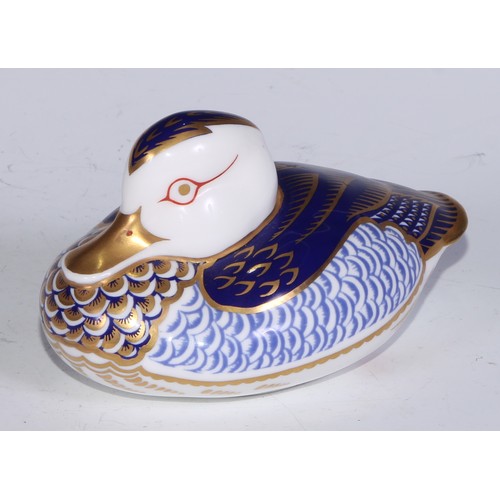 770 - A Royal Crown Derby paperweight, Pheasant, gold stopper; another, similar, no stopper; a Royal Crown... 