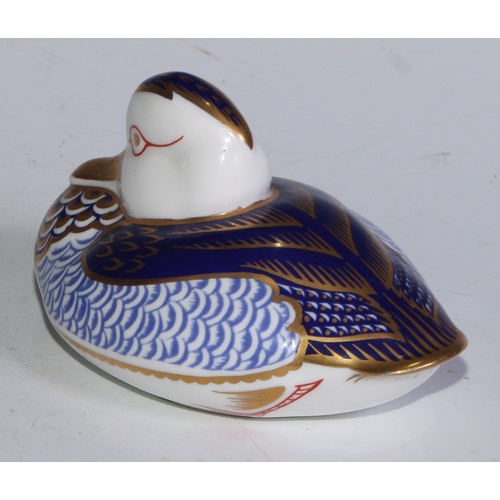 770 - A Royal Crown Derby paperweight, Pheasant, gold stopper; another, similar, no stopper; a Royal Crown... 