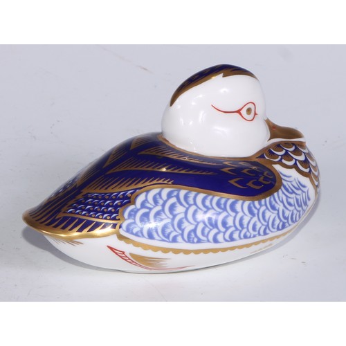 770 - A Royal Crown Derby paperweight, Pheasant, gold stopper; another, similar, no stopper; a Royal Crown... 