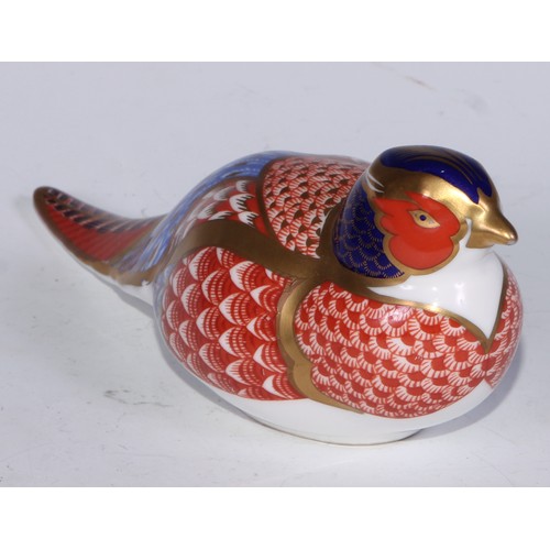 770 - A Royal Crown Derby paperweight, Pheasant, gold stopper; another, similar, no stopper; a Royal Crown... 