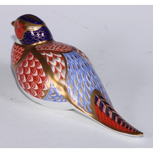 770 - A Royal Crown Derby paperweight, Pheasant, gold stopper; another, similar, no stopper; a Royal Crown... 