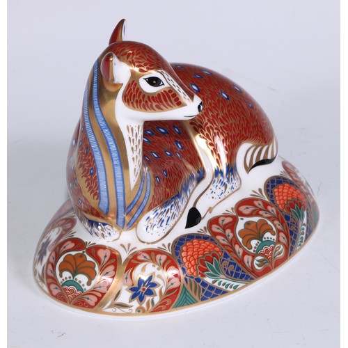 766 - A Royal Crown Derby Collectors Guild Exclusive paperweight, Deer, gold stopper; another similar, Faw... 