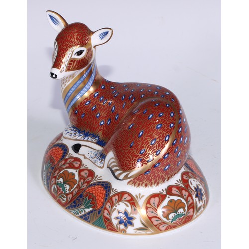 766 - A Royal Crown Derby Collectors Guild Exclusive paperweight, Deer, gold stopper; another similar, Faw... 