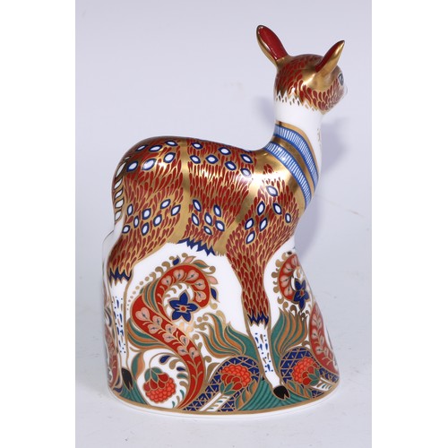 766 - A Royal Crown Derby Collectors Guild Exclusive paperweight, Deer, gold stopper; another similar, Faw... 