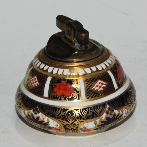 617 - A Royal Crown Derby 1128 pattern table cigarette lighter, 8.5cm diam, printed mark; another; a pair ... 