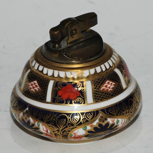 617 - A Royal Crown Derby 1128 pattern table cigarette lighter, 8.5cm diam, printed mark; another; a pair ... 