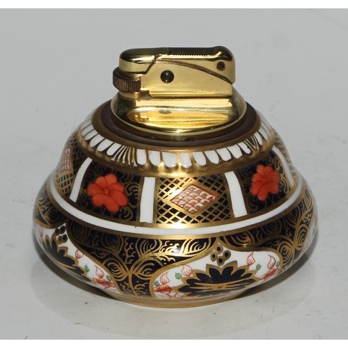 617 - A Royal Crown Derby 1128 pattern table cigarette lighter, 8.5cm diam, printed mark; another; a pair ... 