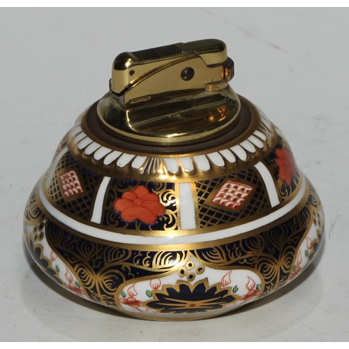 617 - A Royal Crown Derby 1128 pattern table cigarette lighter, 8.5cm diam, printed mark; another; a pair ... 