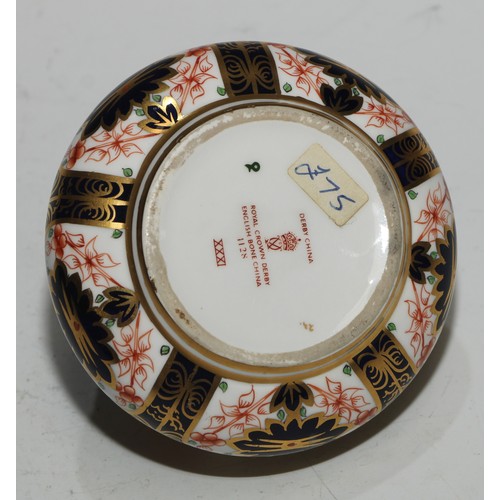 617 - A Royal Crown Derby 1128 pattern table cigarette lighter, 8.5cm diam, printed mark; another; a pair ... 