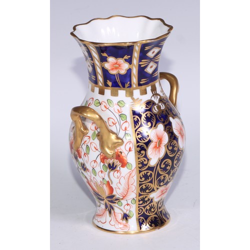 621 - A Royal Crown Derby 6299 pattern Imari fluted ovoid vase, 15cm high, printed mark; vases, similar (3... 