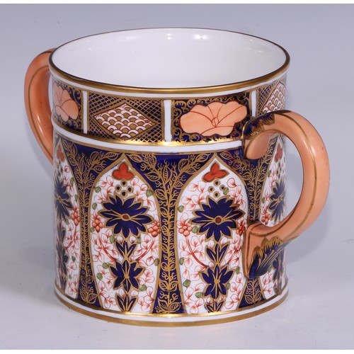 596 - A large Derby Crown Porcelain 1128 pattern two handled loving cup, peach scroll handles, 14cm high, ... 