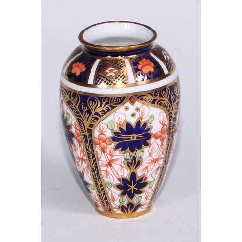 609 - A Royal Crown Derby 1128 Imari miniature ovoid vase, 8cm high, printed mark; an atomizer; etc. (5)