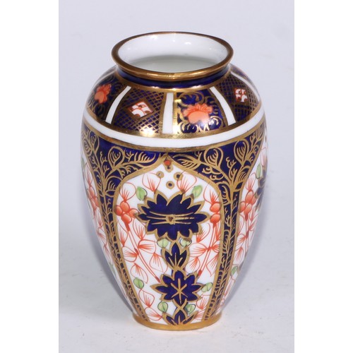 609 - A Royal Crown Derby 1128 Imari miniature ovoid vase, 8cm high, printed mark; an atomizer; etc. (5)