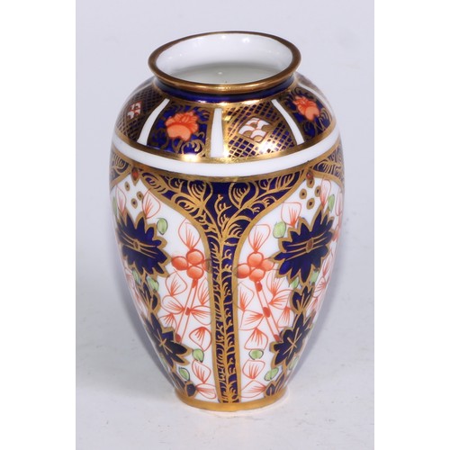 609 - A Royal Crown Derby 1128 Imari miniature ovoid vase, 8cm high, printed mark; an atomizer; etc. (5)