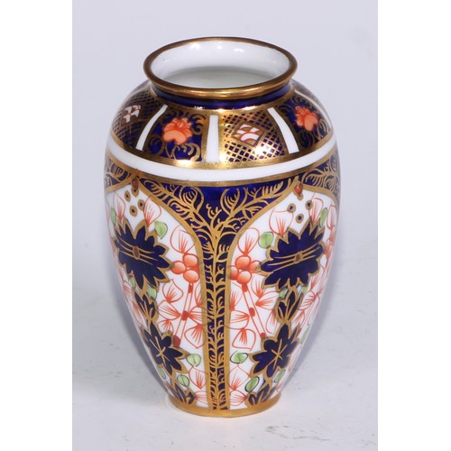 609 - A Royal Crown Derby 1128 Imari miniature ovoid vase, 8cm high, printed mark; an atomizer; etc. (5)