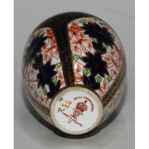 609 - A Royal Crown Derby 1128 Imari miniature ovoid vase, 8cm high, printed mark; an atomizer; etc. (5)