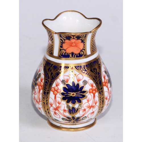 609 - A Royal Crown Derby 1128 Imari miniature ovoid vase, 8cm high, printed mark; an atomizer; etc. (5)