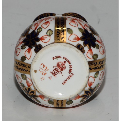 609 - A Royal Crown Derby 1128 Imari miniature ovoid vase, 8cm high, printed mark; an atomizer; etc. (5)