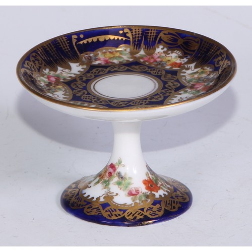 610 - A Royal Crown Derby 1128 Imari pattern miniature teacup and saucer, the saucer 7cm diam, printed mar... 