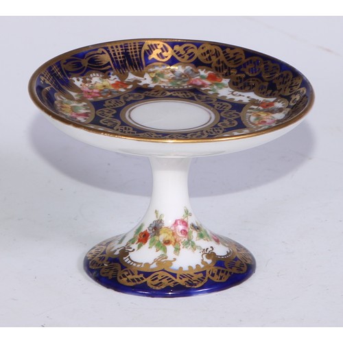 610 - A Royal Crown Derby 1128 Imari pattern miniature teacup and saucer, the saucer 7cm diam, printed mar... 