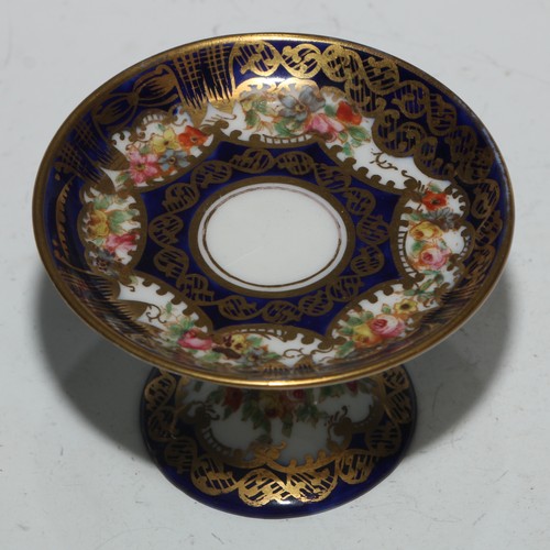 610 - A Royal Crown Derby 1128 Imari pattern miniature teacup and saucer, the saucer 7cm diam, printed mar... 