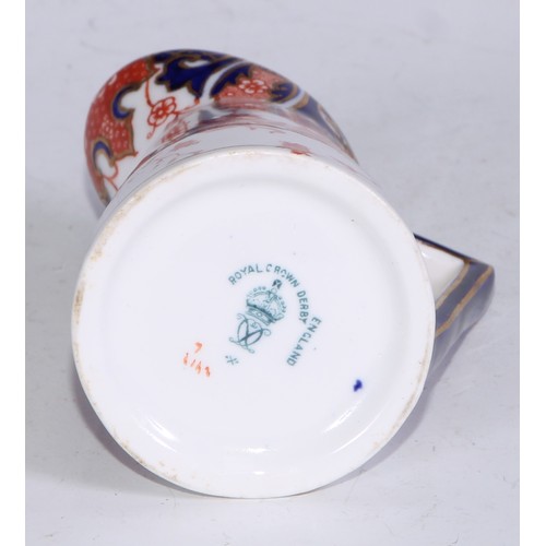 610 - A Royal Crown Derby 1128 Imari pattern miniature teacup and saucer, the saucer 7cm diam, printed mar... 