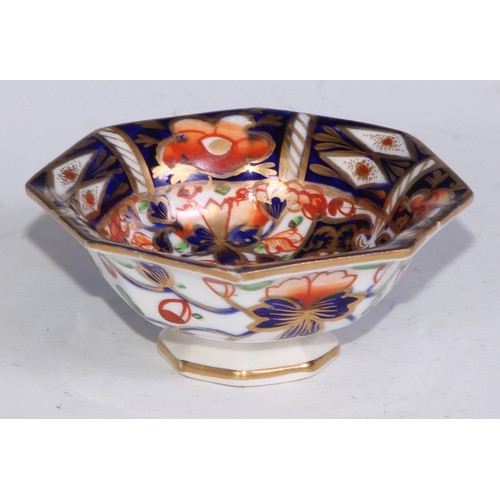 610 - A Royal Crown Derby 1128 Imari pattern miniature teacup and saucer, the saucer 7cm diam, printed mar... 