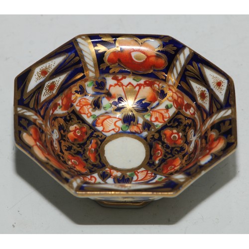 610 - A Royal Crown Derby 1128 Imari pattern miniature teacup and saucer, the saucer 7cm diam, printed mar... 