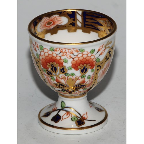 610 - A Royal Crown Derby 1128 Imari pattern miniature teacup and saucer, the saucer 7cm diam, printed mar... 