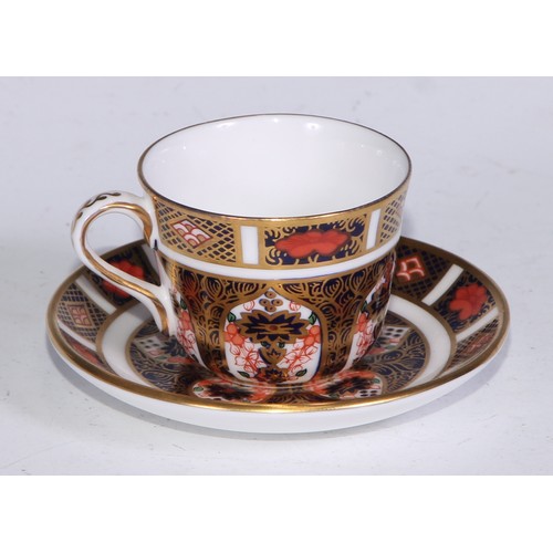 610 - A Royal Crown Derby 1128 Imari pattern miniature teacup and saucer, the saucer 7cm diam, printed mar... 