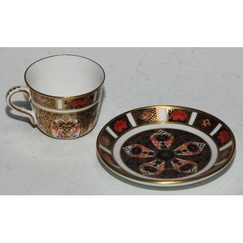 610 - A Royal Crown Derby 1128 Imari pattern miniature teacup and saucer, the saucer 7cm diam, printed mar... 