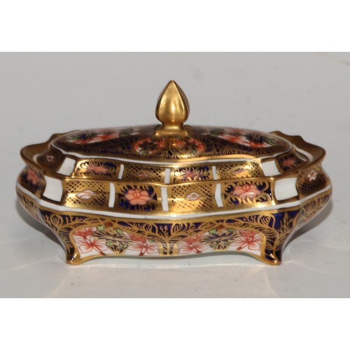 613 - A Royal Crown Derby 1128 pattern lozenge shaped dressing table box and cover, 11cm wide, printed mar... 