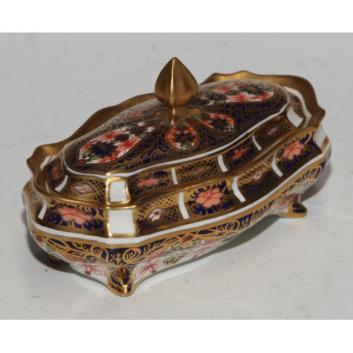 613 - A Royal Crown Derby 1128 pattern lozenge shaped dressing table box and cover, 11cm wide, printed mar... 