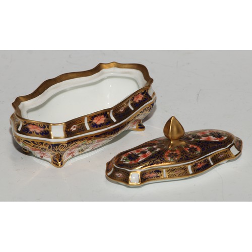 613 - A Royal Crown Derby 1128 pattern lozenge shaped dressing table box and cover, 11cm wide, printed mar... 