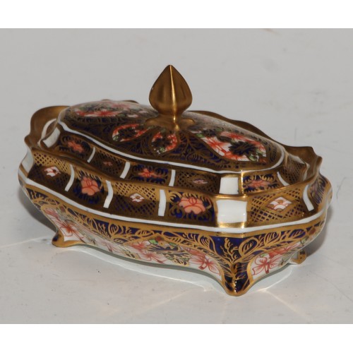 613 - A Royal Crown Derby 1128 pattern lozenge shaped dressing table box and cover, 11cm wide, printed mar... 