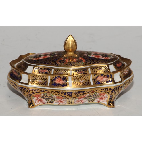 613 - A Royal Crown Derby 1128 pattern lozenge shaped dressing table box and cover, 11cm wide, printed mar... 