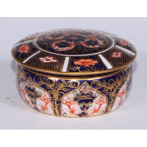 613 - A Royal Crown Derby 1128 pattern lozenge shaped dressing table box and cover, 11cm wide, printed mar... 