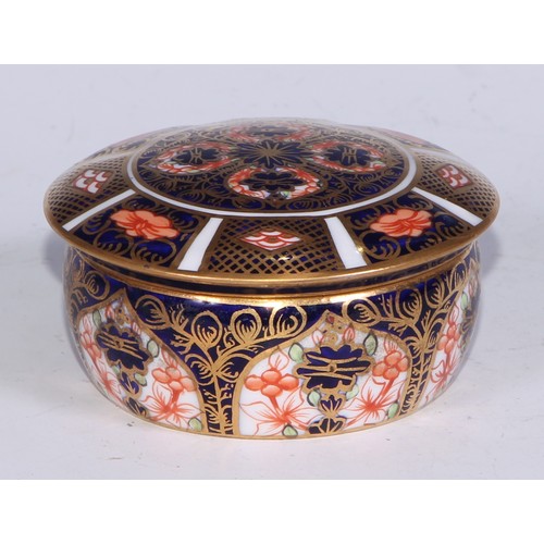 613 - A Royal Crown Derby 1128 pattern lozenge shaped dressing table box and cover, 11cm wide, printed mar... 