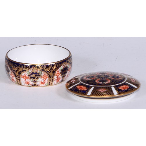 613 - A Royal Crown Derby 1128 pattern lozenge shaped dressing table box and cover, 11cm wide, printed mar... 